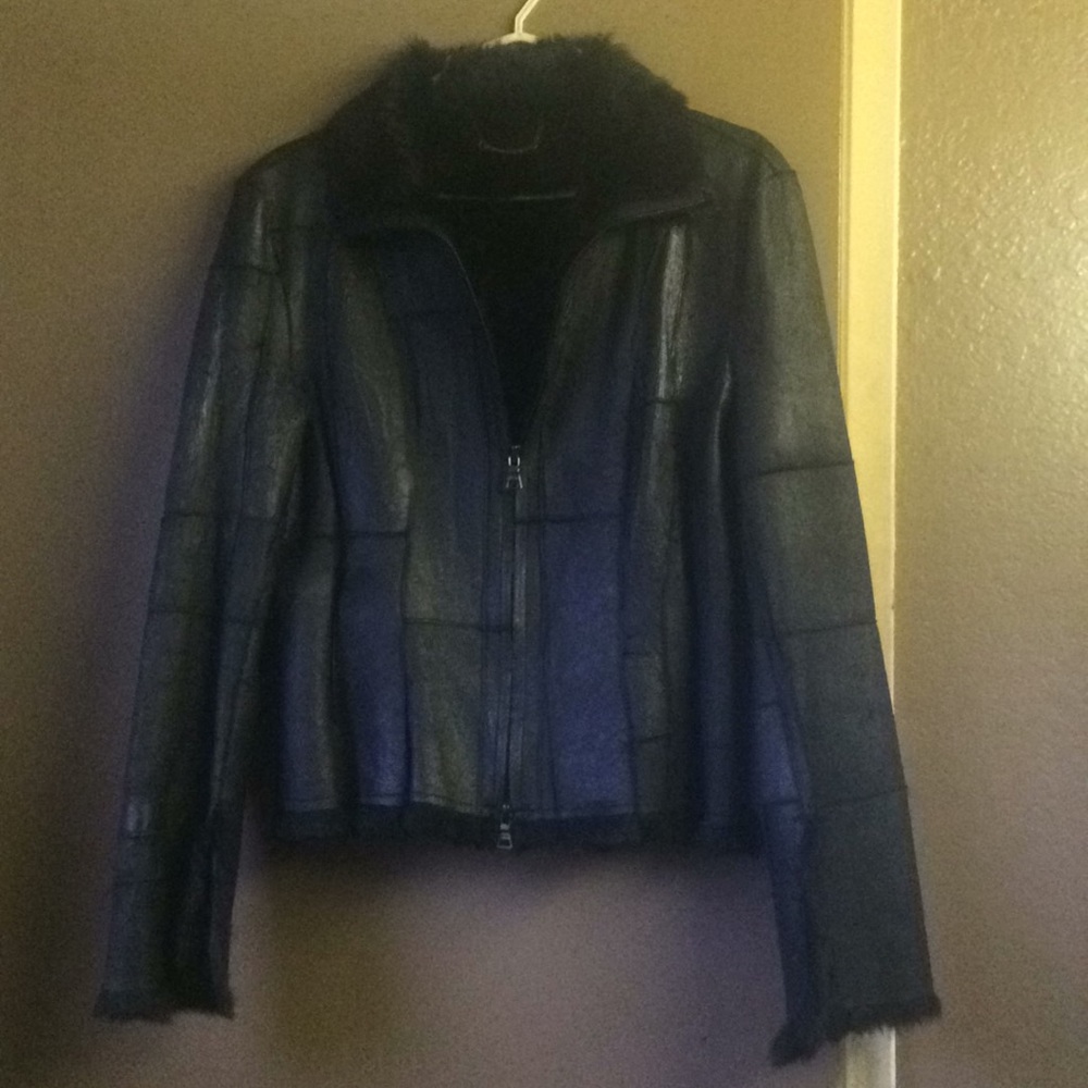 Soft leather outside 100 percent rabbit fur